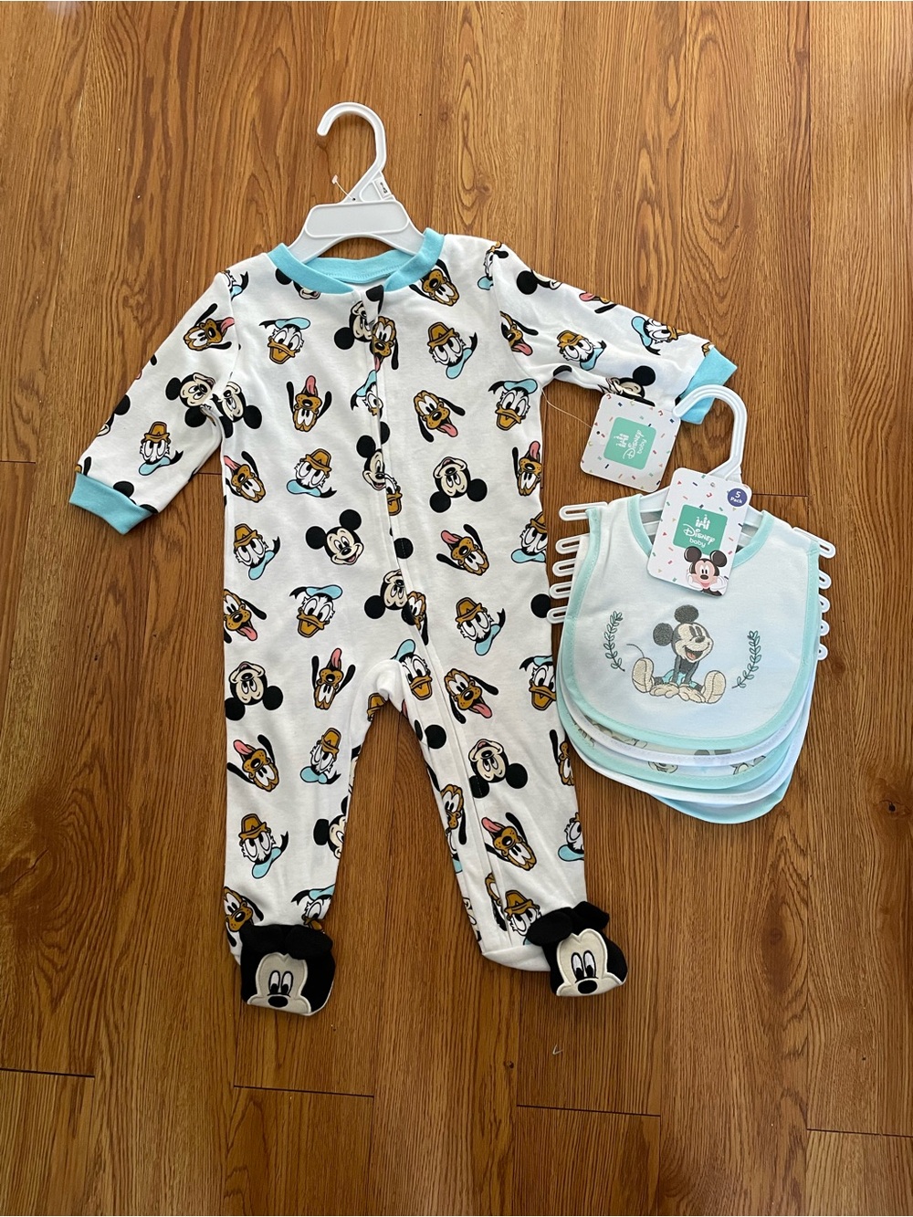 Disney baby footed sleeper and matching bibs